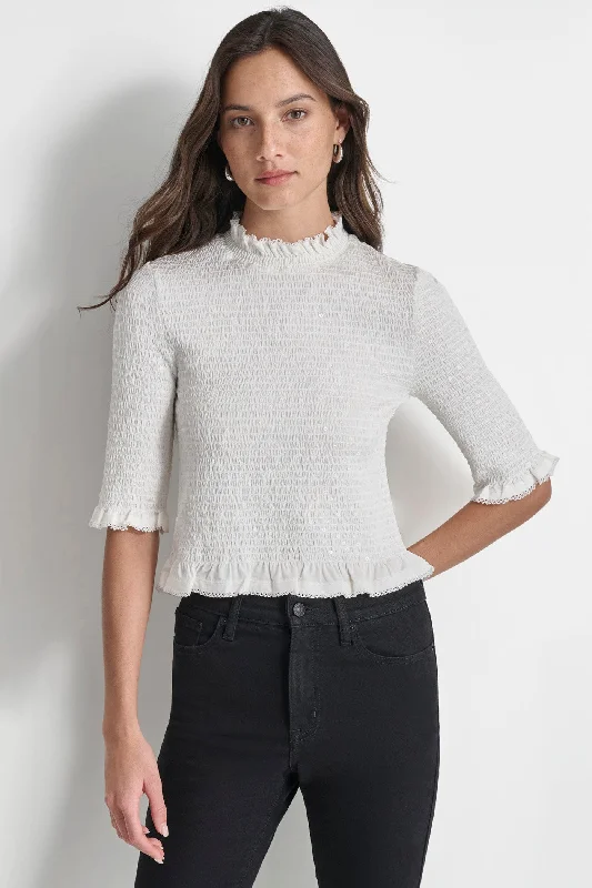 Fashion-forward styles that make a statement   SMOCKED SEQUIN TOP