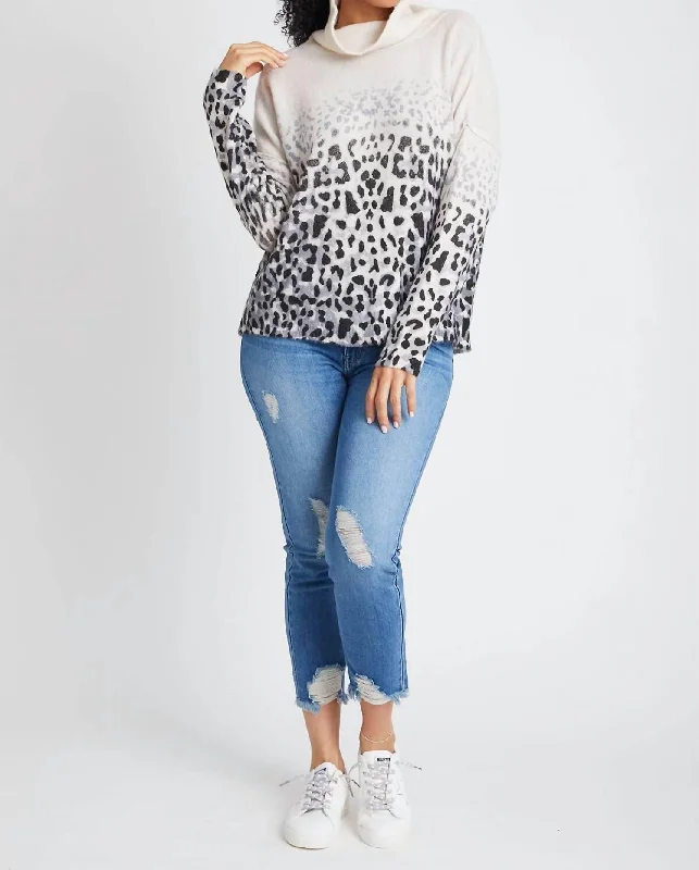 Bold fashion choices for the confident woman   Faded Leopard Cowl Neck Sweater In Ivory/charcoal