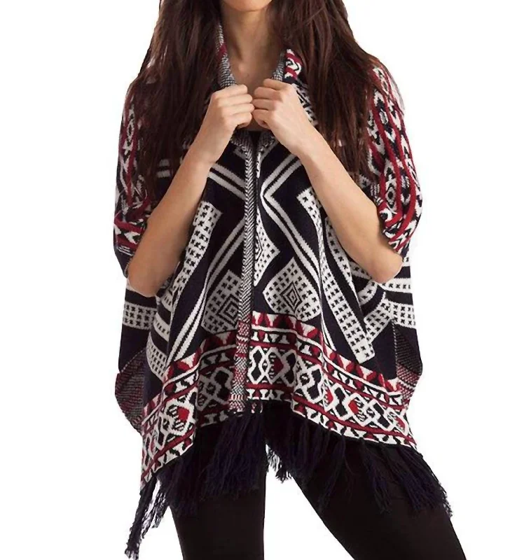 Bold and beautiful clothing for every woman   Hannah Tassel Poncho In Black/red