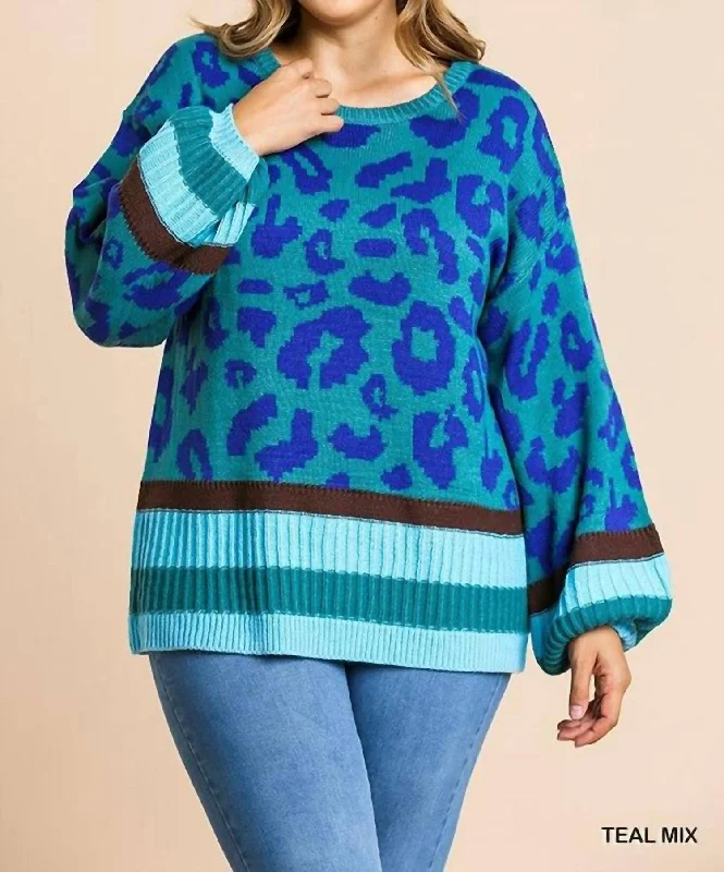 Everyday essentials for a stylish wardrobe   Plus Animal Print Tunic Sweater In Teal Mix
