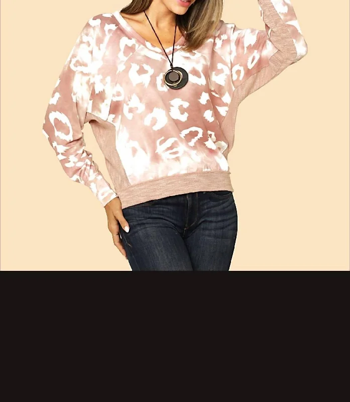 Dress up or down with these versatile pieces   V Neck Leopard Print Sweater In Mauve
