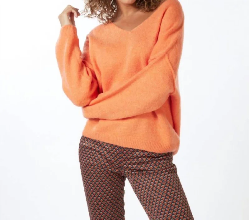 Curated collections for modern, fashionable women   V Neck Sweater In Soft Orange