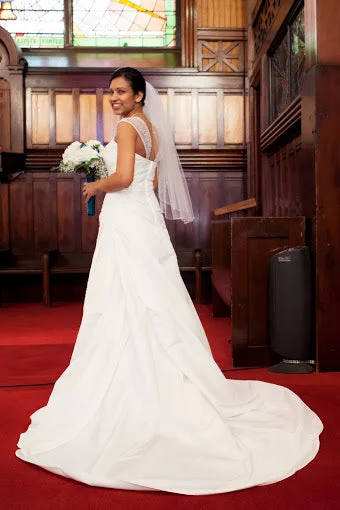 Iconic women’s outfits that never go out of style   David's Bridal Sweetheart Chapel Style Train Strapless with Optio