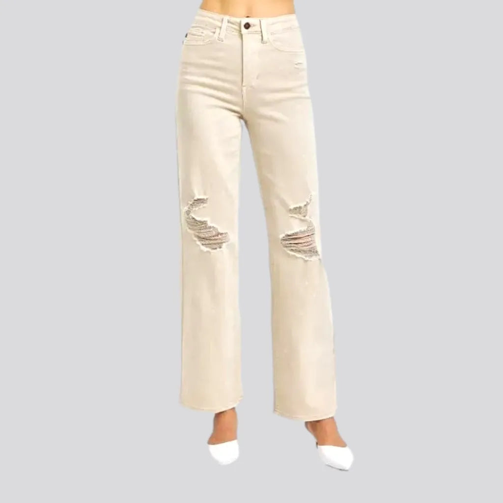 Effortlessly chic fashion for today’s woman   Distressed women's sand jeans